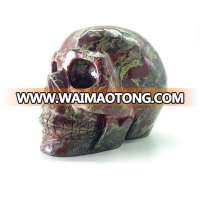 Wholesale natural hand carved crystal dragon blood stone skulls crystal craft skull for decoration